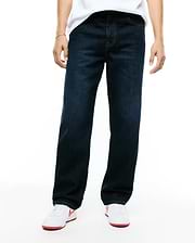 Men's Beck Oversized Denim Pants in dark indigo blue, featuring a relaxed straight leg fit, classic five-pocket styling, and contrasting orange stitching. (1)
