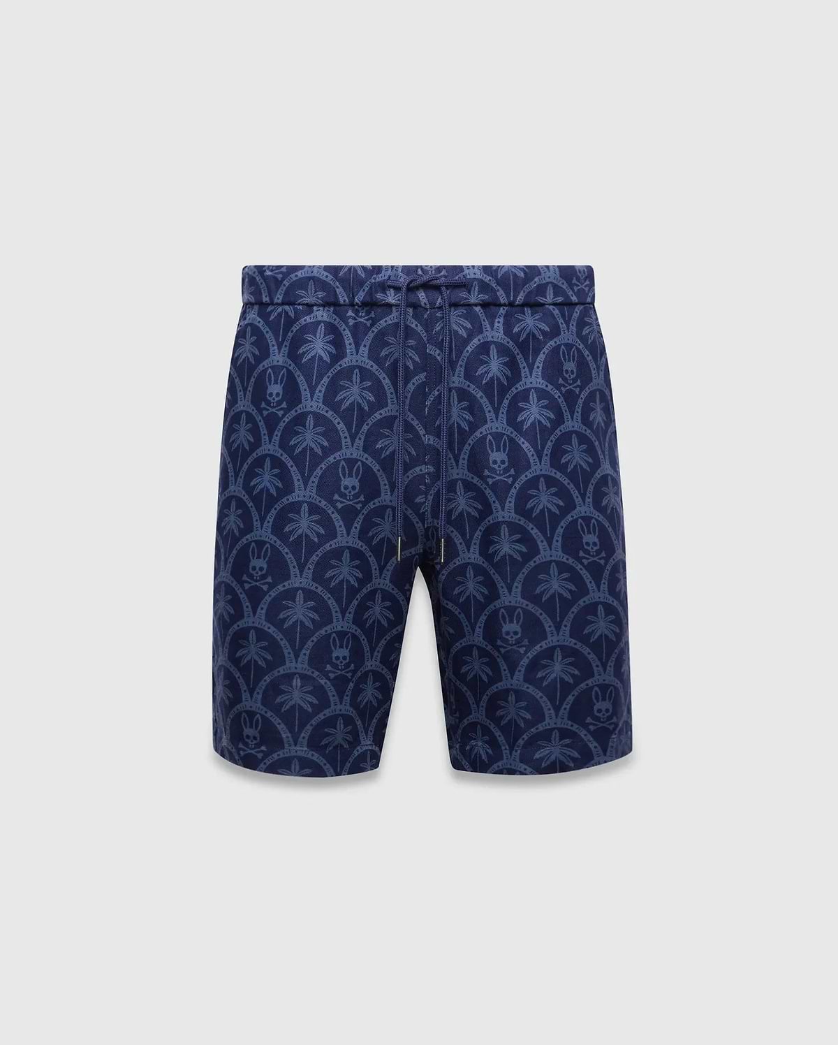 Mens Brad Linen Short 8 1/2, navy blue with a relaxed fit. Features an all-over lighter blue pattern of palm trees and the iconic Psycho Bunny skull logo within scalloped circles, with a drawstring waist. (5)
