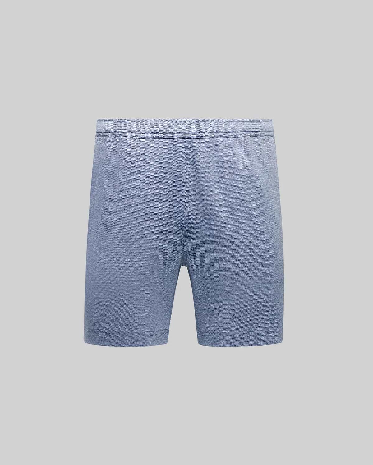 Mens Koda Oxford Short, a relaxed fit heather blue short with a refined oxford knit texture and elastic waistband. Premium streetwear style, no visible logo. (5)