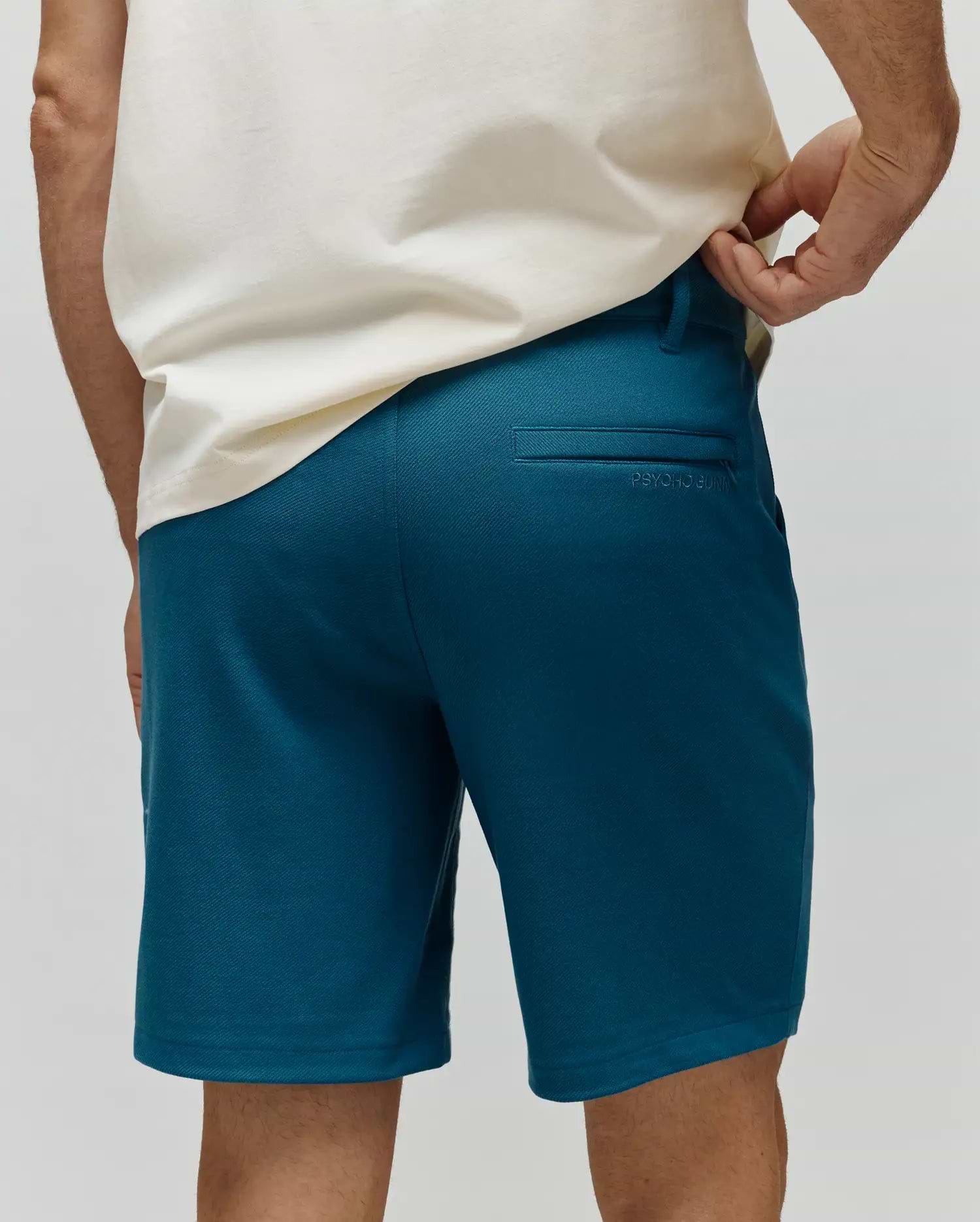 Mens Shiro Twill Short in deep teal, featuring a classic fit, fine twill fabric, and subtle tonal Psycho Bunny embroidery above the back right welt pocket. (3)
