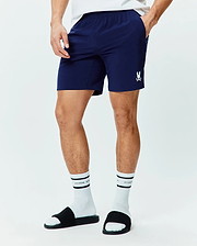 Mens Blaze Sport Short, navy blue classic fit shorts in smooth performance fabric with an elastic waistband, side pockets, and a small white embroidered Psycho Bunny skull logo on the left leg.