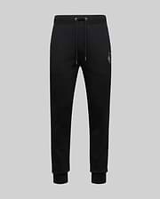 The Psycho Bunny MENS AUGUSTE JOGGER - MB0800015 are black 100% cotton joggers with a drawstring waist, ribbed cuffs, and a small embroidered crest on the left hip, shown against a plain light grey background.