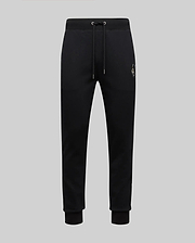 The Psycho Bunny MENS AUGUSTE JOGGER - MB0800015 are black 100% cotton joggers with a drawstring waist, ribbed cuffs, and a small embroidered crest on the left hip, shown against a plain light grey background.