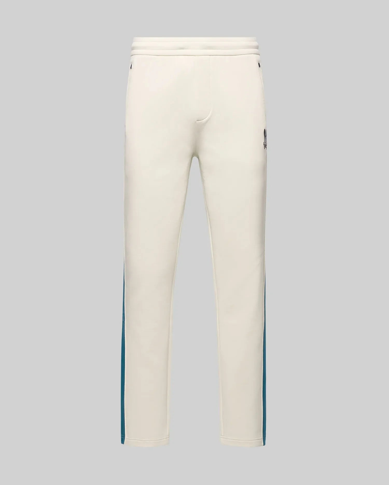 Mens Caspian Track Pant in cream smooth jersey, featuring a relaxed fit, teal side stripes, and a small embroidered Psycho Bunny skull logo on the upper right thigh. (5)
