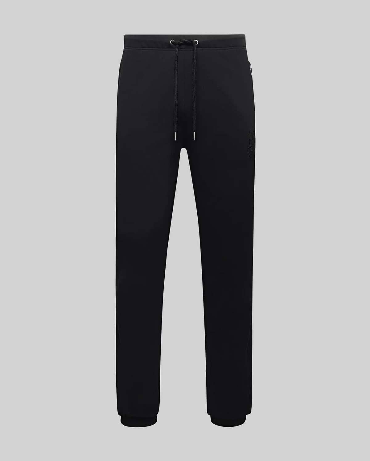 Mens Barry Joggers, black relaxed fit smooth jersey knit with drawstring waist, ribbed cuffs, and a tonal embroidered Psycho Bunny skull logo on the upper right thigh.