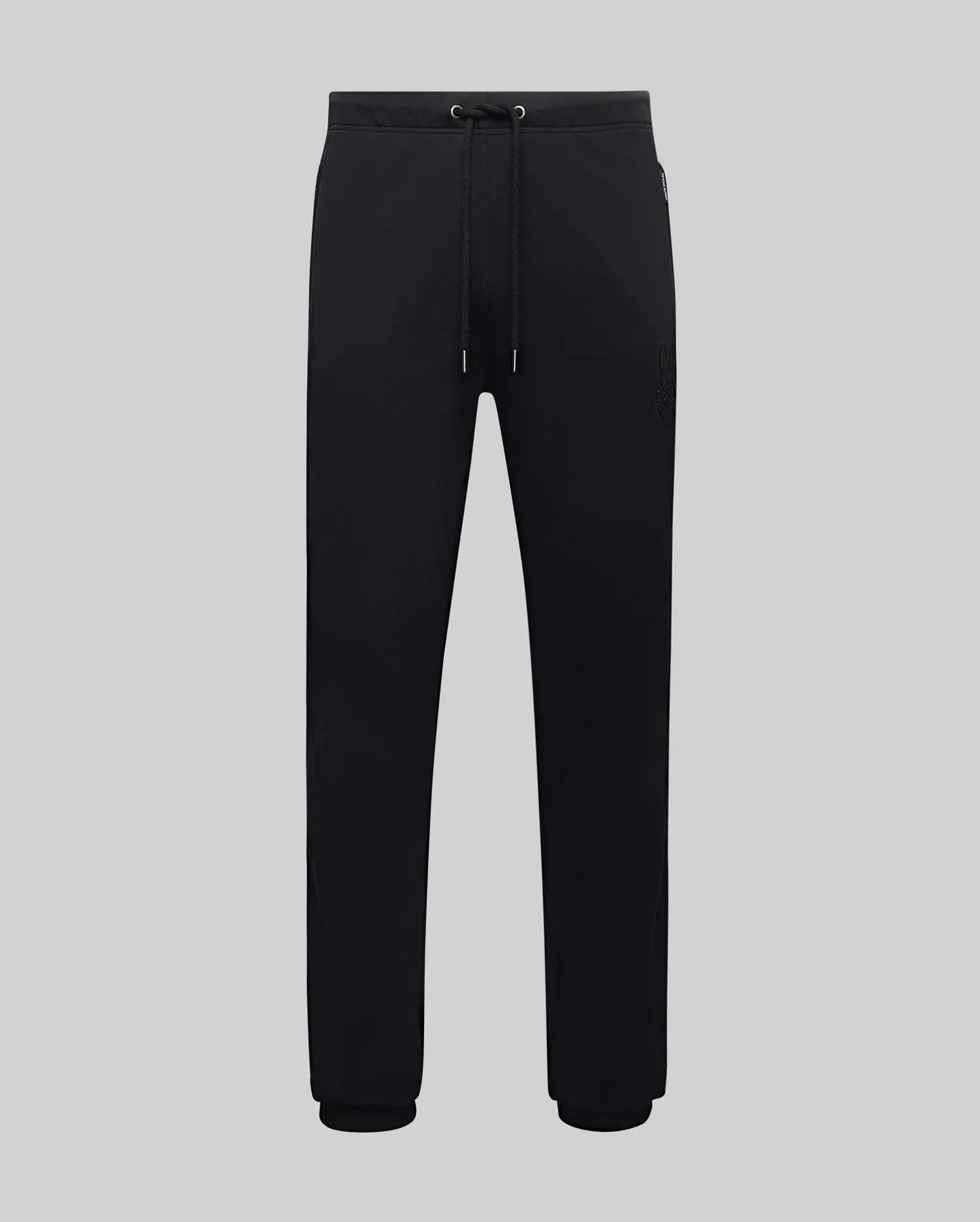 Mens Barry Joggers, black relaxed fit smooth jersey knit with drawstring waist, ribbed cuffs, and a tonal embroidered Psycho Bunny skull logo on the upper right thigh.