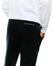 Mens Nathaniel Sweatpant, black relaxed fit French terry, featuring a small white embroidered Psycho Bunny text logo above the back right pocket. (4)