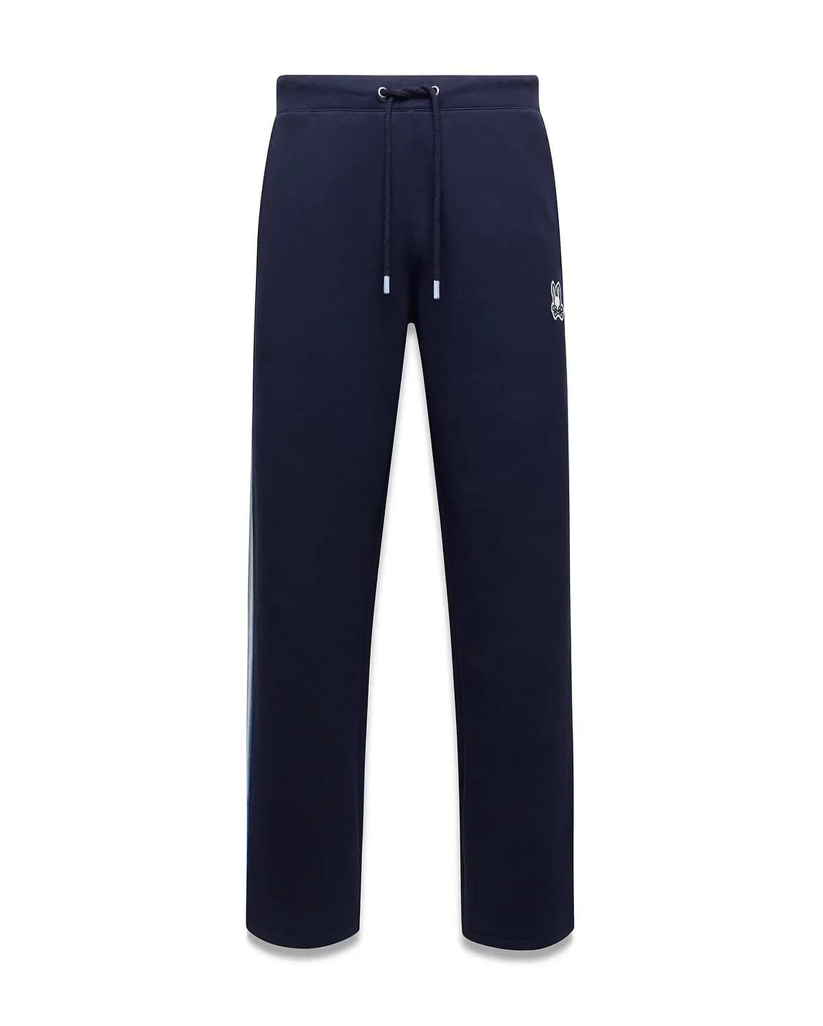 Mens Jaydon Track Pant, navy French terry with a relaxed fit, featuring a white drawstring waist, vertical blue and green side stripe, and a small embroidered white Psycho Bunny skull logo on the right thigh. (5)