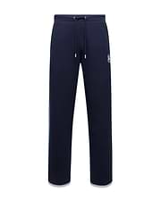 Mens Jaydon Track Pant, navy French terry with a relaxed fit, featuring a white drawstring waist, vertical blue and green side stripe, and a small embroidered white Psycho Bunny skull logo on the right thigh. (5)