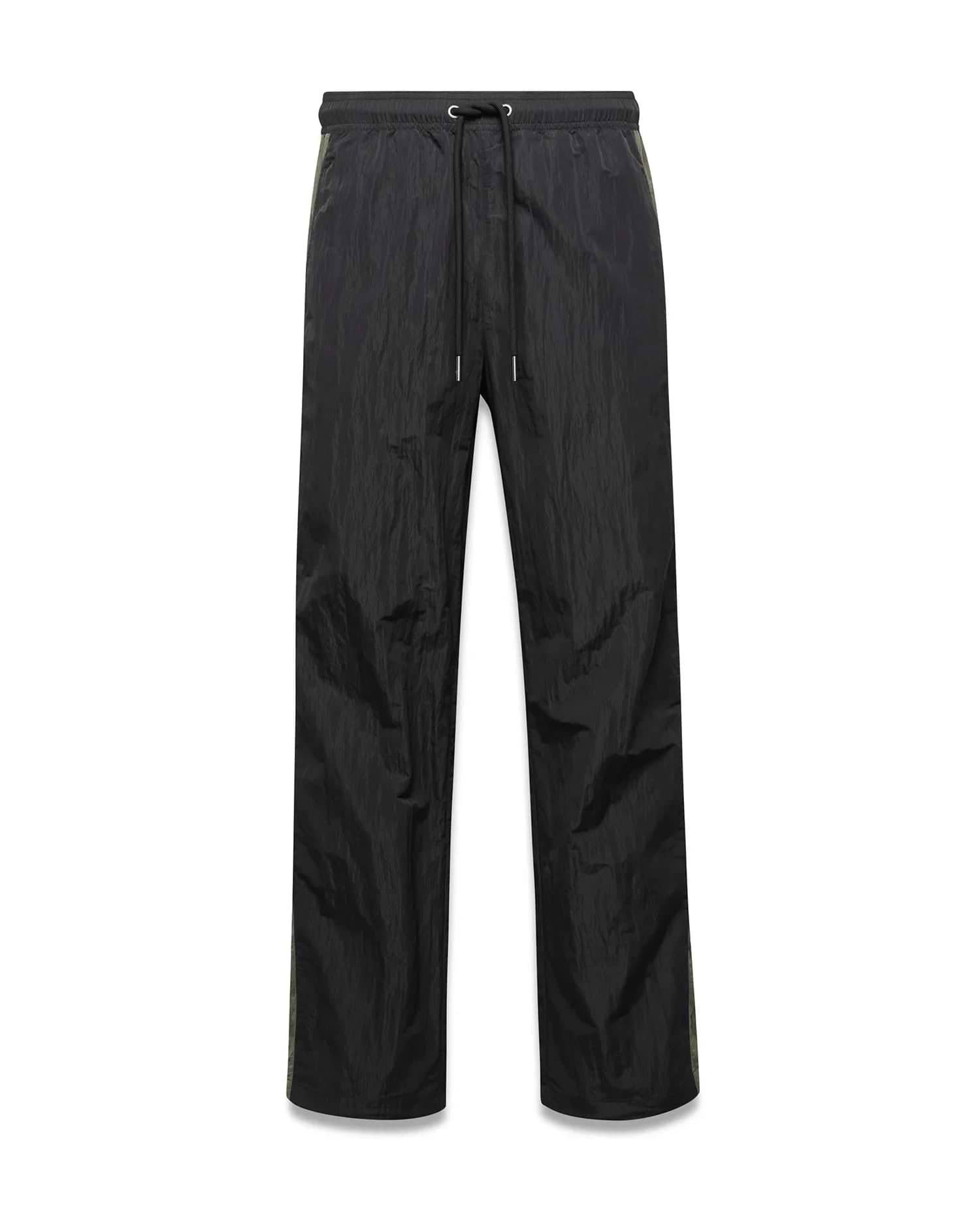 Mens Alder Nylon Colorblock Pant in black crinkled nylon, offering a relaxed fit with a drawstring waist and distinct olive green side stripes.