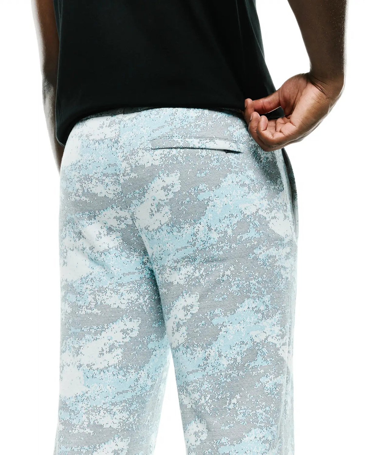 Men's Alfie Graphic Sweatpants, a relaxed fit pair in soft jersey fabric, showcasing a vibrant light blue, white, and grey digital camouflage pattern with a discreet back pocket. (3)