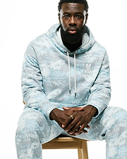 Relaxed fit light blue and grey pixelated Psycho Bunny hoodie and matching Men's Alfie Graphic Sweatpants, featuring a small white embroidered bunny skull logo on the chest. (4)