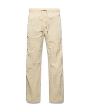 Mens Alder Nylon Pant in light beige with a crinkled nylon texture, featuring a relaxed straight-leg fit and an elasticated drawstring waist. (5)