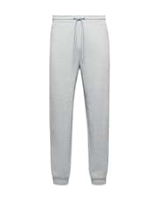 Mens Terrence Brushed Fleece Sweatpant in heather grey, a relaxed fit with tapered leg, ribbed cuffs, drawstring waist, and small embroidered Psycho Bunny skull logo on the left thigh.