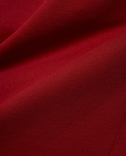 Mens Terrence Brushed Fleece Jogger in a deep, luxurious burgundy red, a close-up revealing the soft, plush texture of the brushed fleece fabric with subtle diagonal knit details. (6)