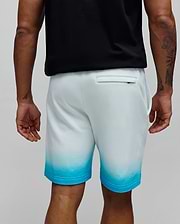 Mens Dax Sweatshort, a relaxed fit white French terry sweatshort with an ombre fade to vibrant turquoise at the hem and a back welt pocket. (3)