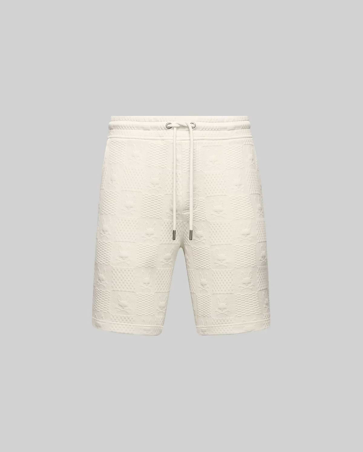Mens Dustin Sweatshort, cream textured knit with all-over embossed Psycho Bunny skull and checkerboard pattern, relaxed fit, drawstring waist with metal tips. (5)