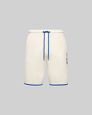 Mens Toby Short, cream french terry relaxed fit shorts with royal blue drawstring, hem piping, and a printed Psycho Bunny skull logo on the left thigh. (5)