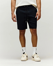 Black Mens Maxton Waffle Sweatshort with a relaxed fit, featuring a textured waffle knit fabric and an adjustable drawstring waist. (1)