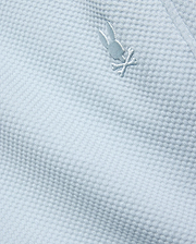 Mens Marc Textured Short in light blue, featuring a premium textured knit fabric and a small, iconic tone-on-tone embroidered Psycho Bunny skull logo.