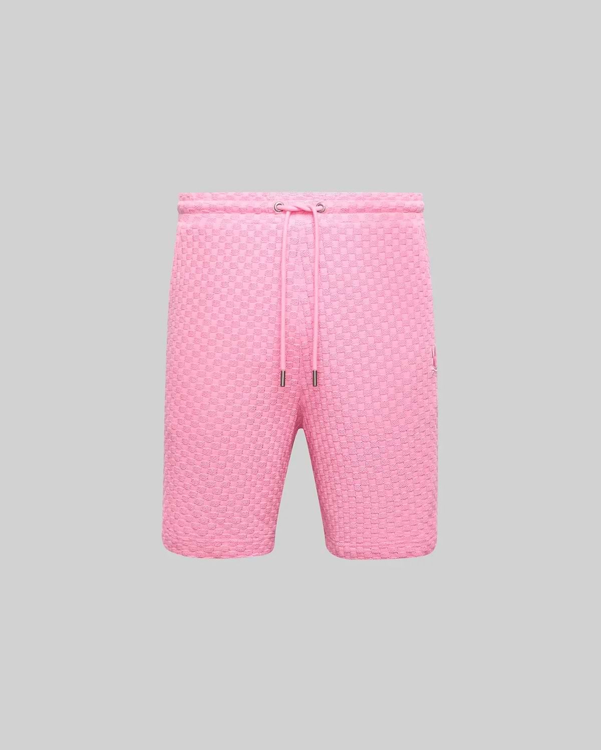 Mens Garen Knit Short in vibrant pink, featuring a textured knit fabric, relaxed fit, drawstring waist with silver aglets, and a small embroidered Psycho Bunny skull logo on the right thigh. (4)