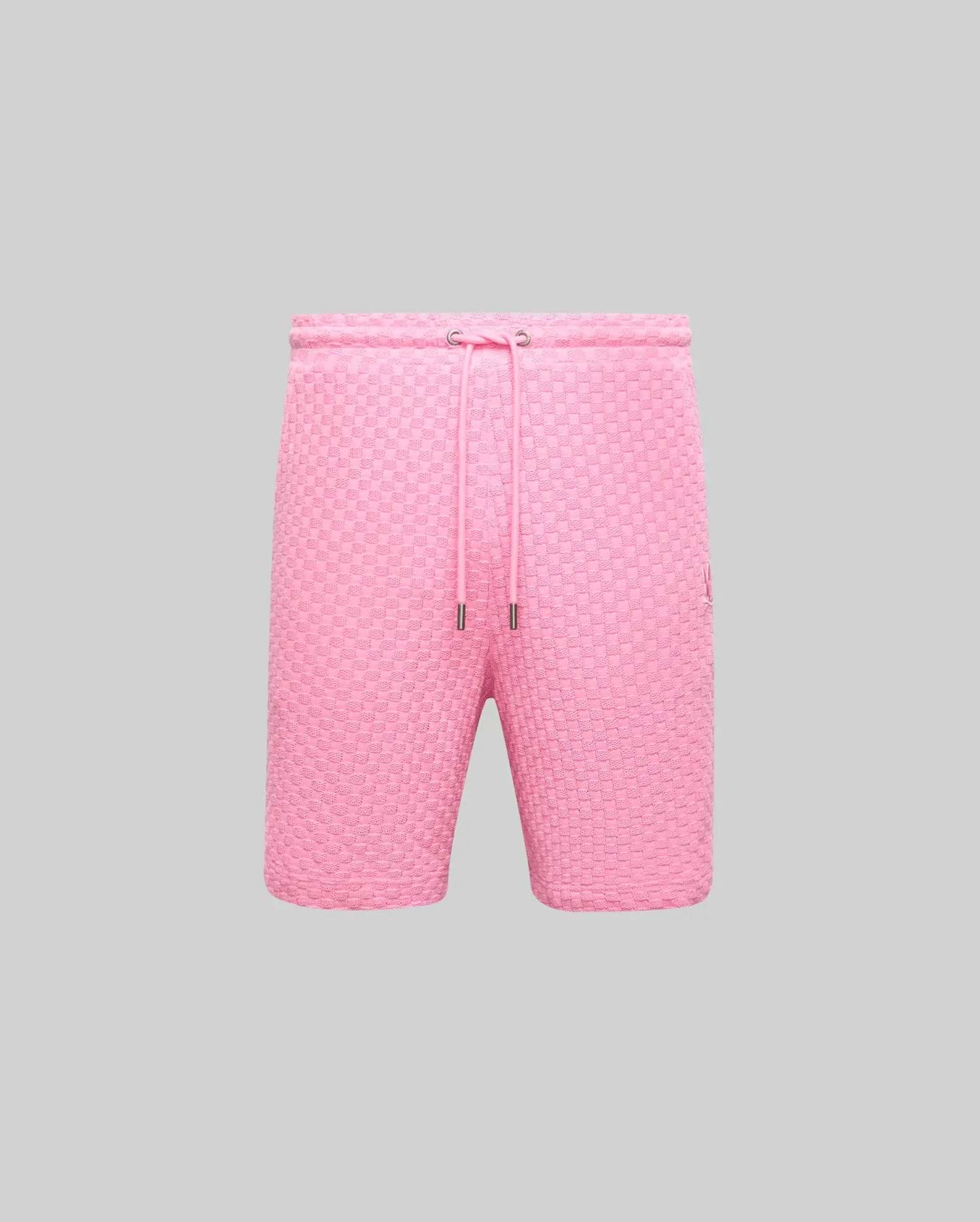 Mens Garen Knit Short in vibrant pink, featuring a textured knit fabric, relaxed fit, drawstring waist with silver aglets, and a small embroidered Psycho Bunny skull logo on the right thigh. (4)