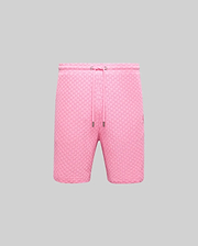 Mens Garen Knit Short in vibrant pink, featuring a textured knit fabric, relaxed fit, drawstring waist with silver aglets, and a small embroidered Psycho Bunny skull logo on the right thigh. (4)