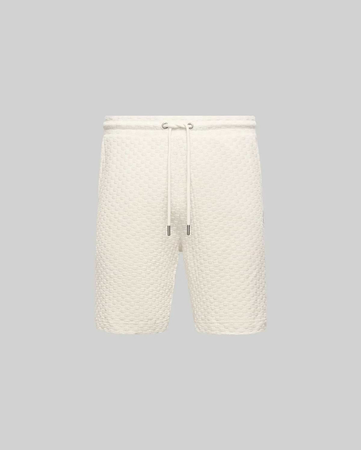 Mens Garen Knit Short in cream, featuring a relaxed fit and a distinctive waffle knit texture with a comfortable drawstring waist and sleek silver-tipped cords. (4)