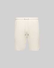 Mens Garen Knit Short in cream, featuring a relaxed fit and a distinctive waffle knit texture with a comfortable drawstring waist and sleek silver-tipped cords. (4)