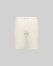 Mens Garen Knit Short in cream, featuring a relaxed fit and a distinctive waffle knit texture with a comfortable drawstring waist and sleek silver-tipped cords. (4)