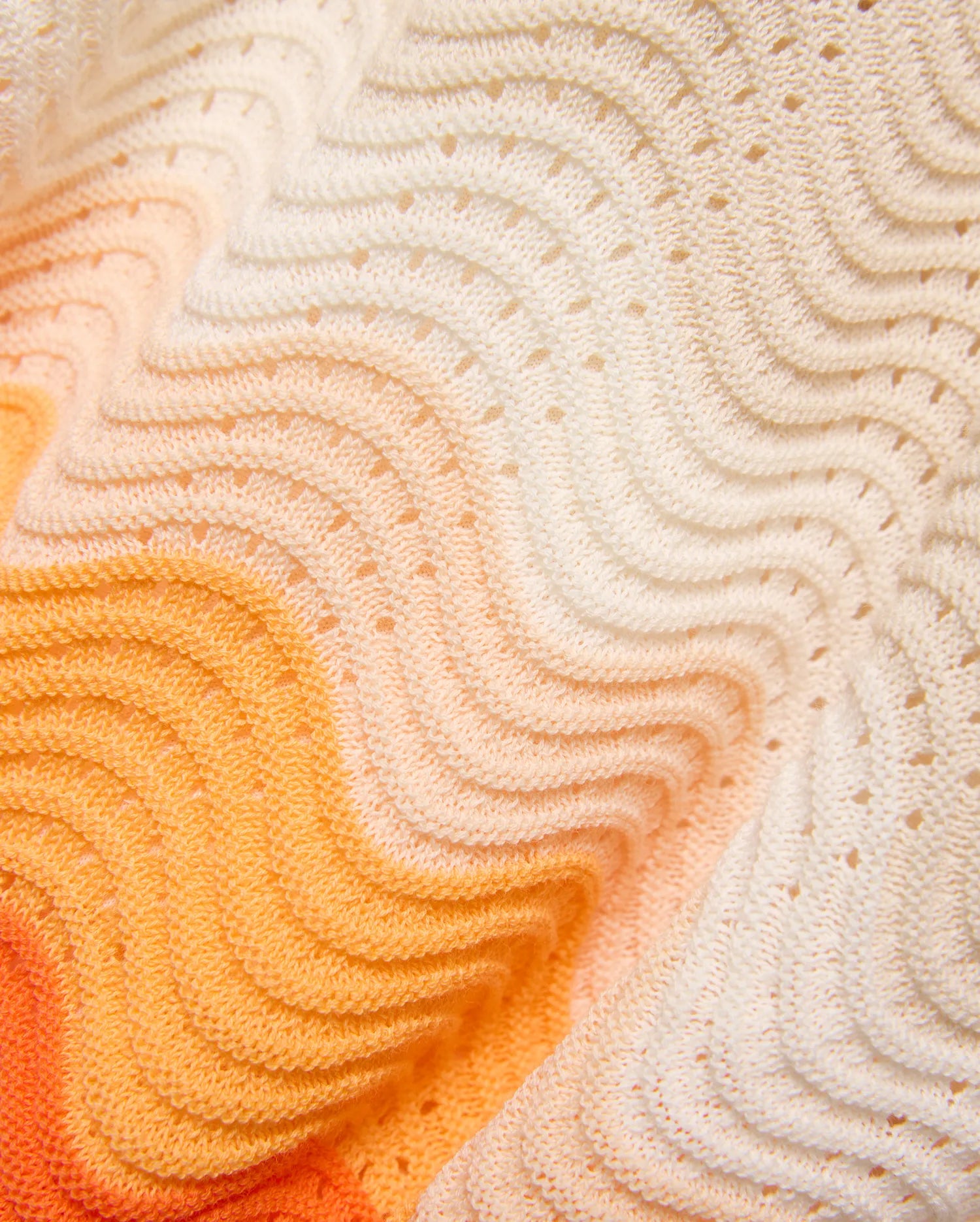 Mens Holden Knit Short 6 showcasing a vibrant orange to white ombre gradient on a premium, soft textured knit fabric with an intricate wavy open-knit pattern.