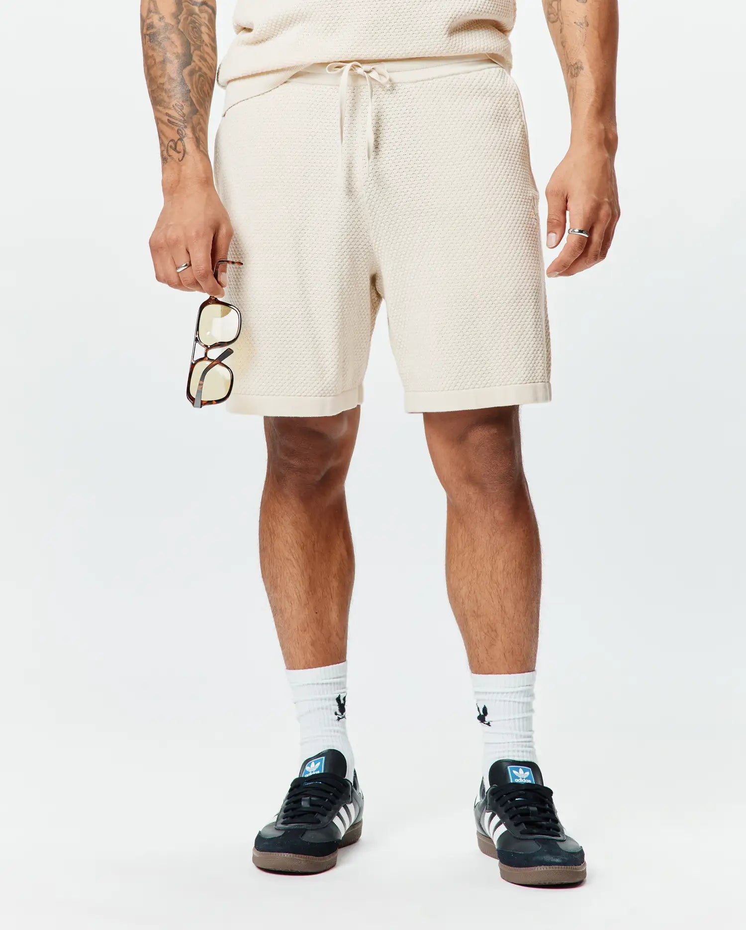 Mens Devon Knit Short, a premium relaxed fit cream textured waffle knit short, featuring a comfortable drawstring waist, soft hand feel, and refined streetwear style.