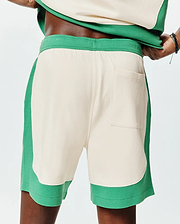 Mens Kelly Short, a relaxed fit cream and vibrant kelly green color-blocked jersey short featuring an elastic waistband and a single back patch pocket. (2)