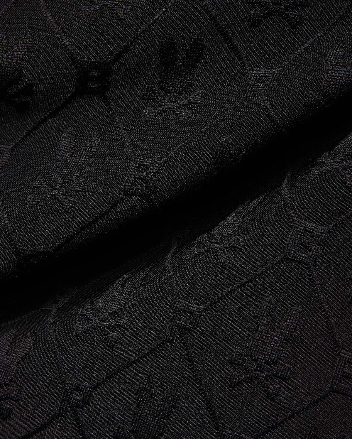 Mens Garry Jacquard Sweatshort in black, featuring a tonal all-over jacquard knit pattern of the iconic Psycho Bunny skull logo and PB initials.