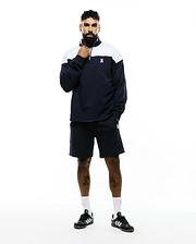 Navy French terry quarter-zip sweatshirt with white color block and embroidered Psycho Bunny skull logo, paired with matching Mens Gabe French Terry Sweatshort featuring an embroidered bunny skull. (1)