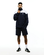 Navy French terry quarter-zip sweatshirt with white color block and embroidered Psycho Bunny skull logo, paired with matching Mens Gabe French Terry Sweatshort featuring an embroidered bunny skull. (1)