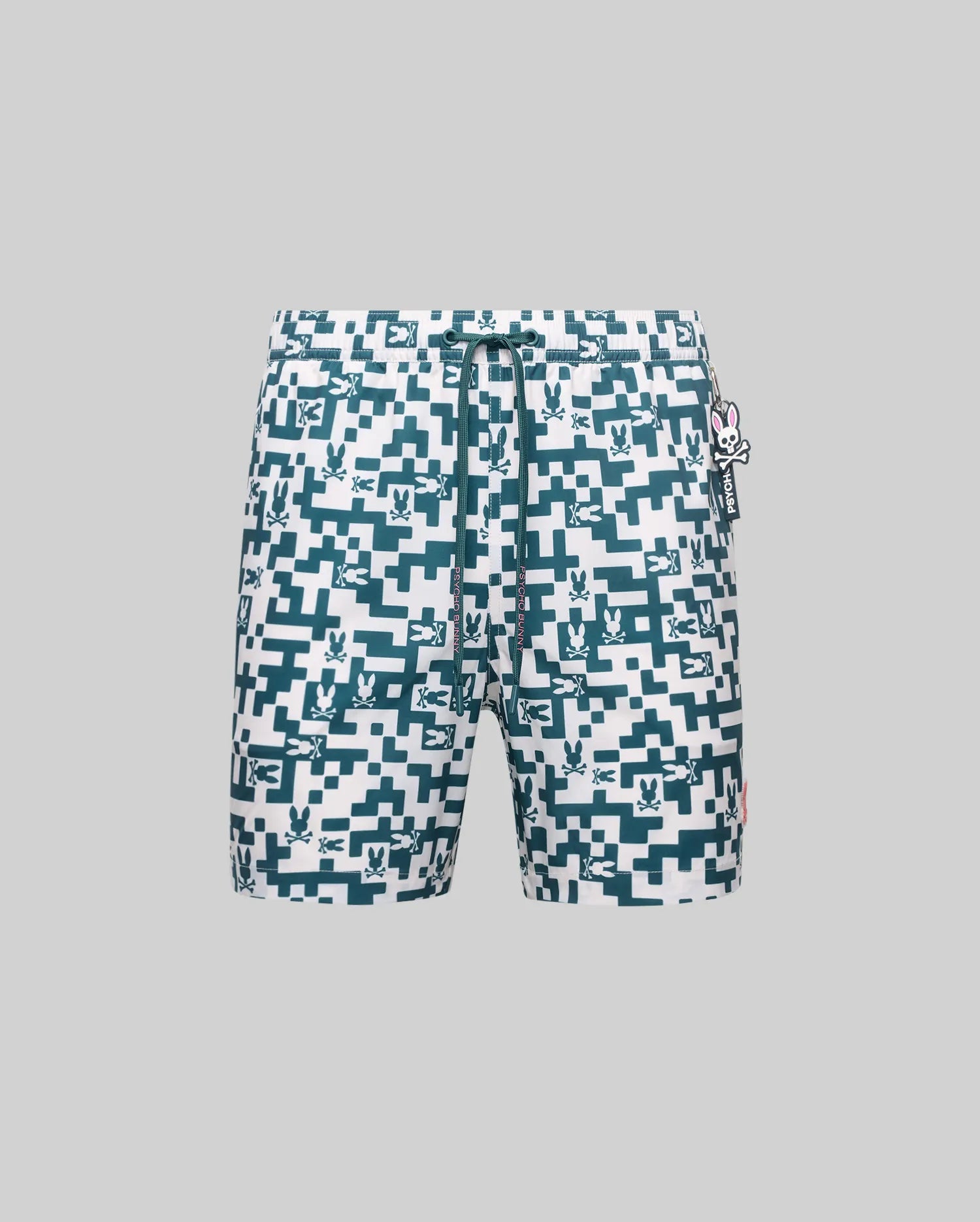 Mens Josh Swim Trunk in white with a teal digital pixelated pattern featuring repeated bunny skull logos, a matching drawstring, a small red side tag, and a Psycho Bunny charm.