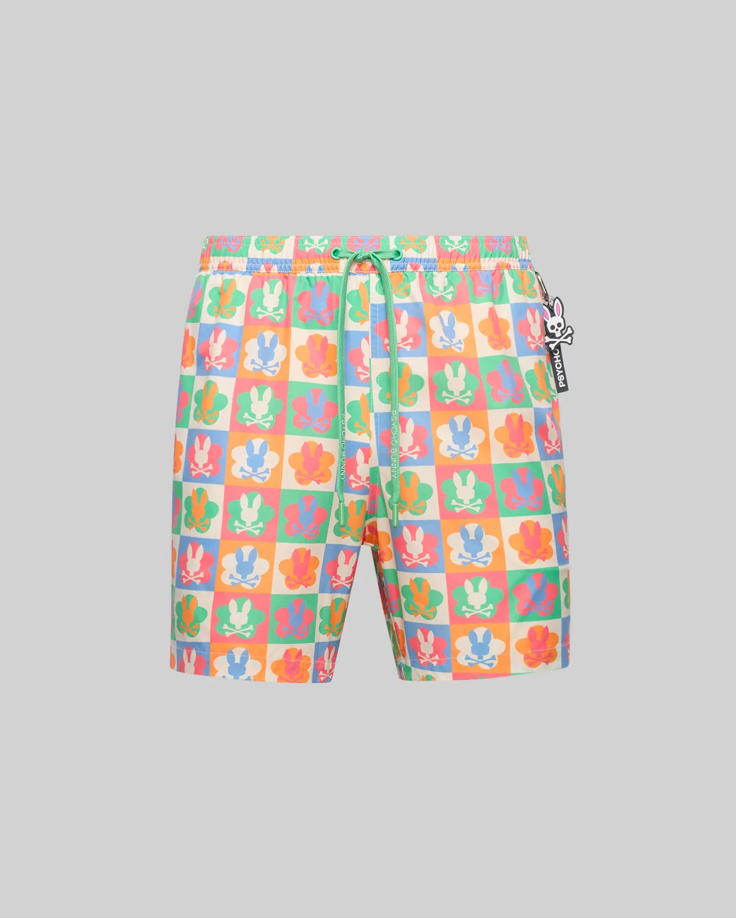 Mens Aiden Swim Trunk, vibrant multi-color checkered pattern featuring Psycho Bunny skull and flower graphics. Relaxed fit, smooth fabric, with a small bunny skull charm and branded green drawstring. (5)