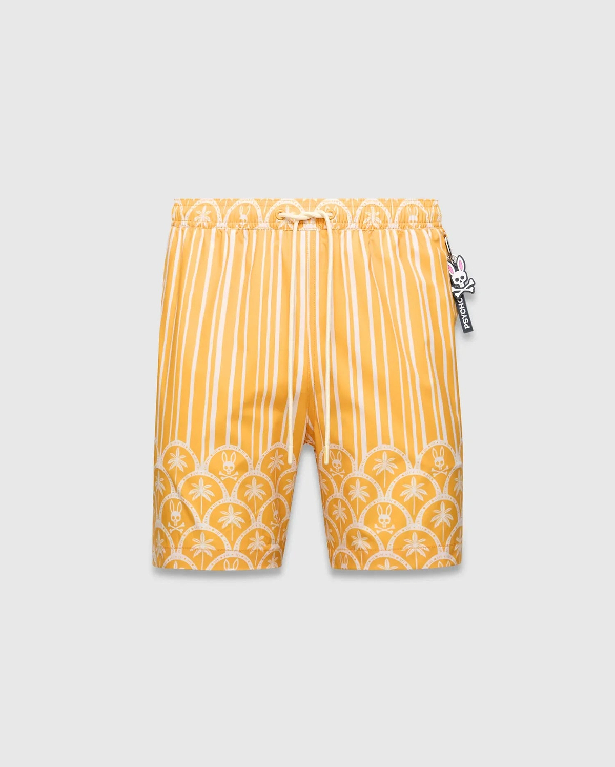 Mens Brad Swim Trunk. Yellow and white striped swim trunks with a scalloped pattern of palm trees and small Psycho Bunny skull logos. Relaxed fit, smooth fabric, drawstring waist, Psycho Bunny logo tag.