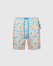 Mens Frank Swim Trunk 6, a classic fit swim trunk featuring an all-over white, blue, orange, and yellow intricate tile pattern with floral motifs and small Psycho Bunny skull logos, finished with a blue drawstring and logo charm.