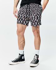 Mens Byron Swim Trunk 6, black with an all-over vibrant multi-color Psycho Bunny skull and crossbones print, featuring a classic fit, smooth quick-dry fabric, and a small Psycho Bunny logo tag. (1)