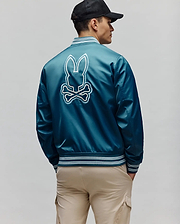 Mens Thomas Satin Bomber in deep teal satin, featuring a large embroidered white and light blue Psycho Bunny skull logo on the back, with striped ribbed cuffs, collar, and hem.