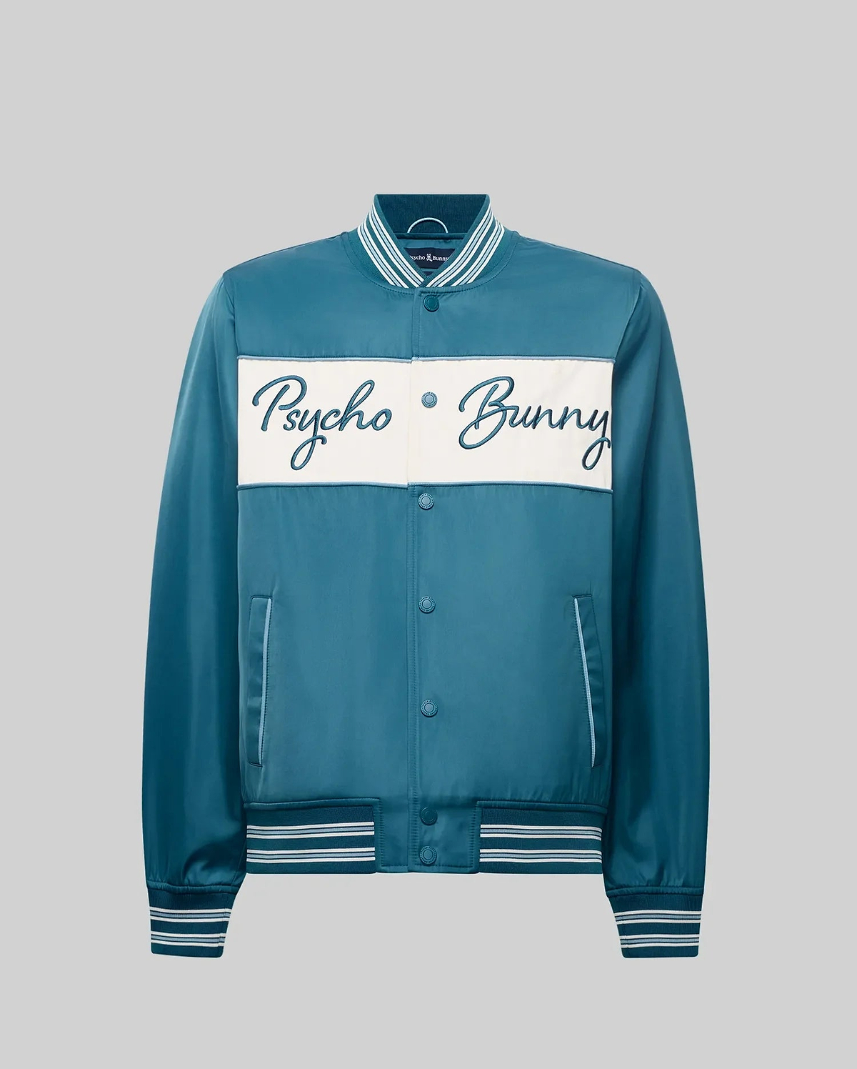 Mens Thomas Satin Bomber in deep teal, classic fit, smooth satin, white chest stripe with large dark blue embroidered Psycho Bunny script, and white/light blue striped ribbed trim.