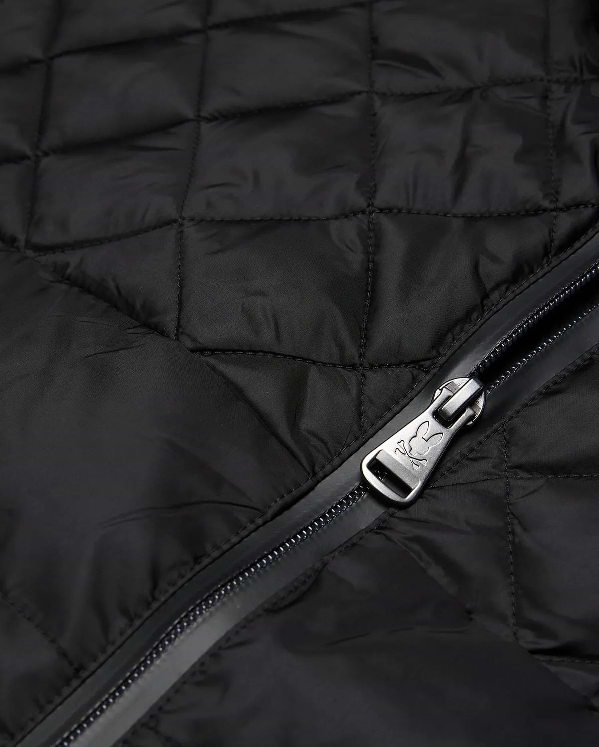 Mens Emerik Puffer Jacket in black quilted nylon, featuring a full-zip closure with a metallic Psycho Bunny skull logo embossed on the zipper pull.