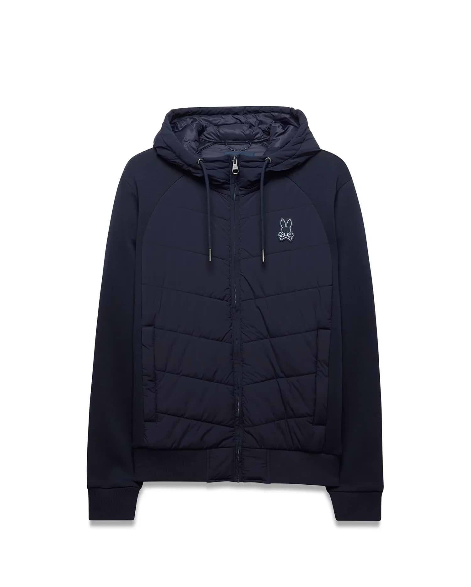 Mens Gordley Mix Media Jacket in navy, full-zip, with a quilted front panel, smooth raglan sleeves, ribbed cuffs and hem, and a small embroidered white Psycho Bunny skull logo on the left chest. (4)