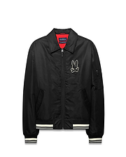 Mens Nathaniel Satin Coach Jacket, black with red lining, featuring a large white embroidered Psycho Bunny skull logo on the chest, white striped ribbed cuffs and hem, and a zippered sleeve pocket. (5)