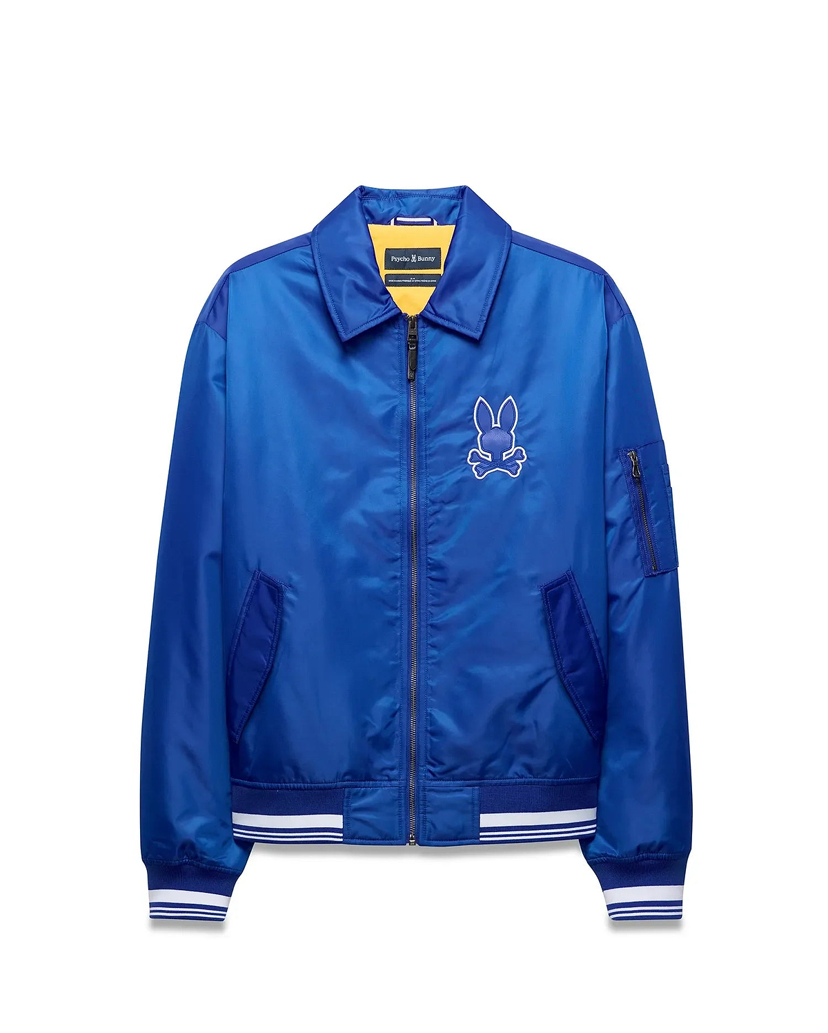 Mens Nathaniel Satin Coach Jacket, royal blue satin, full-zip, ribbed cuffs/hem with white stripes, zippered sleeve pocket, and large white embroidered Psycho Bunny skull logo on left chest. (6)