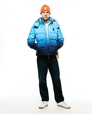 Men's Solan Puffer Jacket, a classic fit quilted puffer jacket featuring a blue ombre design from light to dark, with a vibrant orange interior lining and a small embroidered Psycho Bunny skull logo on the left chest. (4)