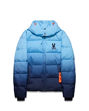 Men's Solan Puffer Jacket, an ombre light blue to navy quilted design with a hooded collar, small embroidered black Psycho Bunny skull logo on the left chest, and an orange branded tag. (5)