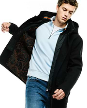MENS LUTHER WOOL BLEND COAT, a black hooded classic fit coat with button closure, featuring a quilted black lining with an orange Psycho Bunny skull and crossbones pattern and a small embroidered logo on the sleeve.